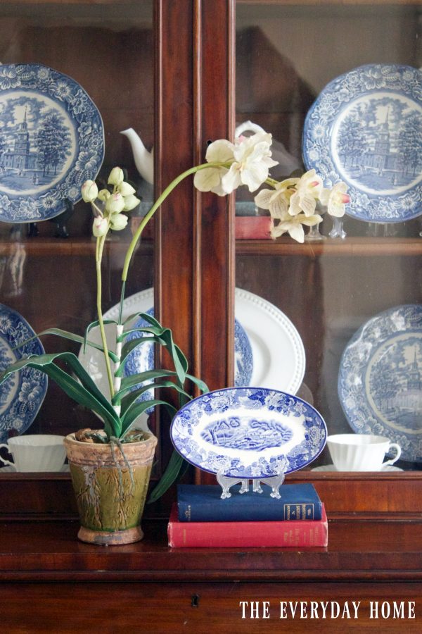 orchid-and-blue-dishes-on-hutch | The Everyday Home | www.everydayhomeblog.com